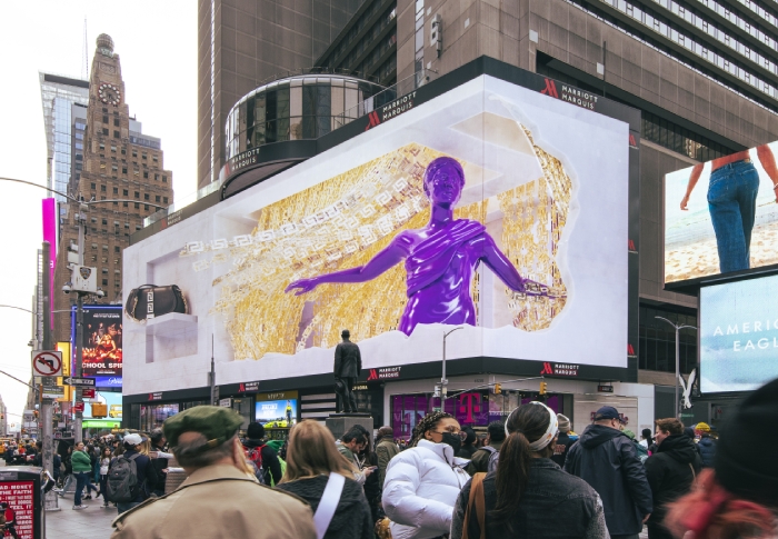 The Versace's purple Goddess who opens the gold curtain in the New York anamorphic video