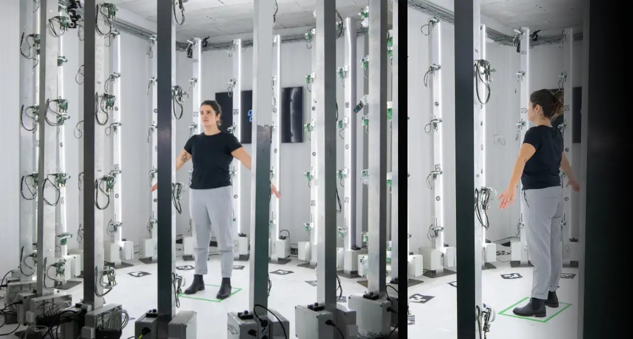 Team member inside the 3D Scan cage